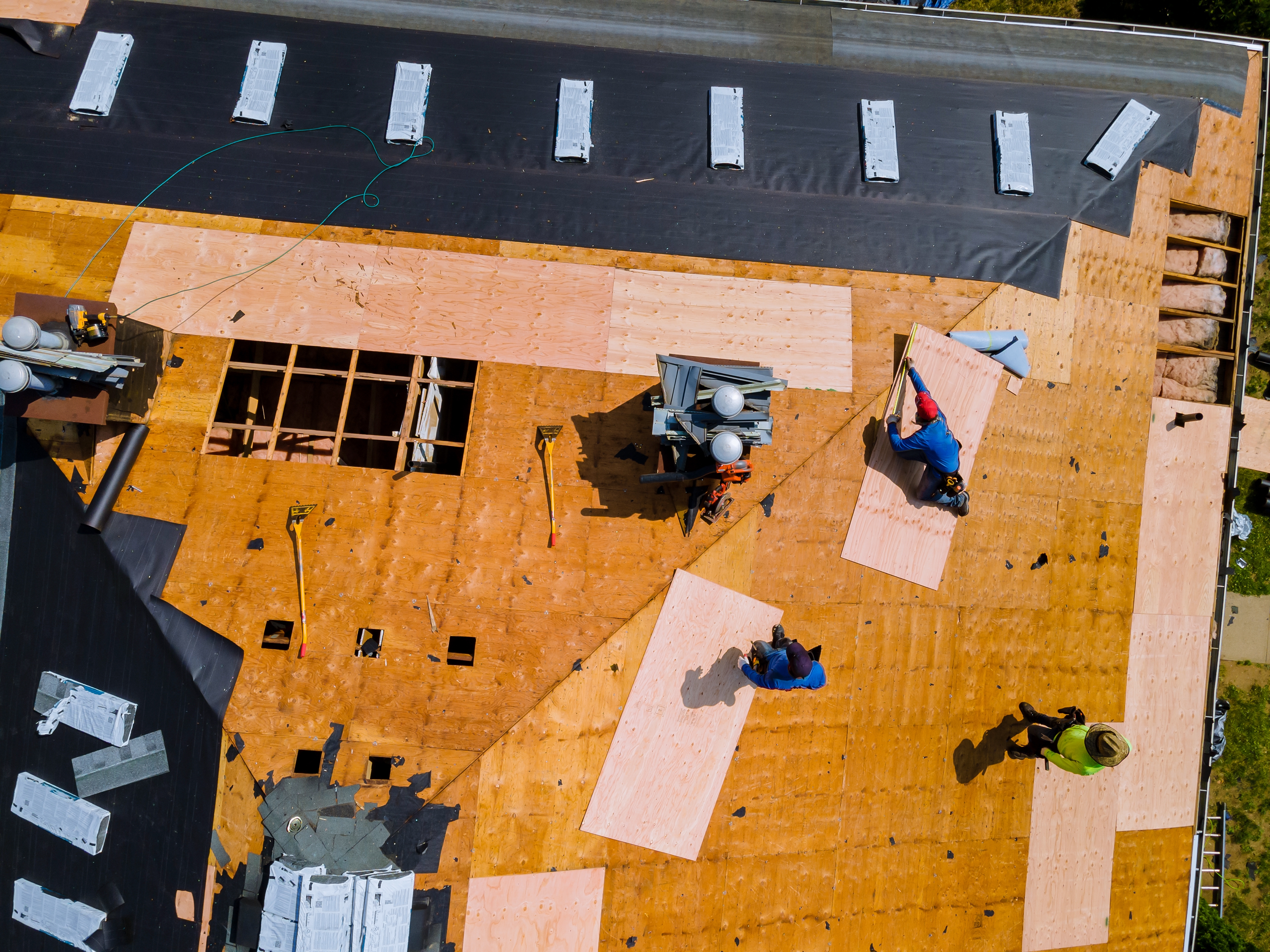 Old damaged roof removal process